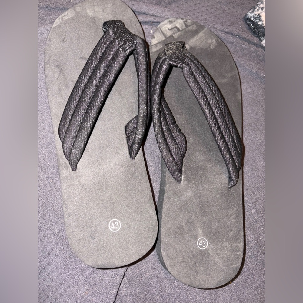 2 Pairs of Black Flip Flops